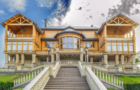 Big beautiful wooden house, cottage. Residence of former Ukrainian President Yanukovich in Kiev. Ukraineのeditorial素材