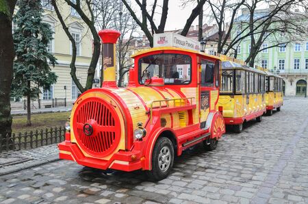 Colorful paravoz, train on the street Market Square in Lviv. Ukraineのeditorial素材