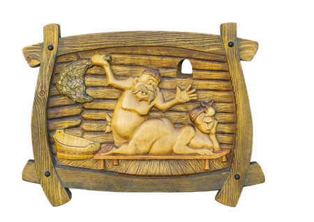 Wooden souvenir. Naked man and woman swimming in the bath, the sauna. Massage and careの写真素材