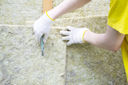 Repairman cut the wall tilesの写真素材