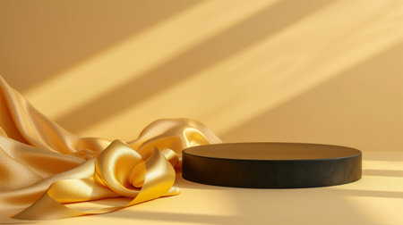 black podium on a gold minimalistic background. A golden satin ribbon lies nearby.の素材