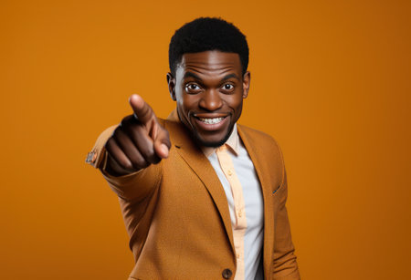 a black man pointing his finger at camera,の素材