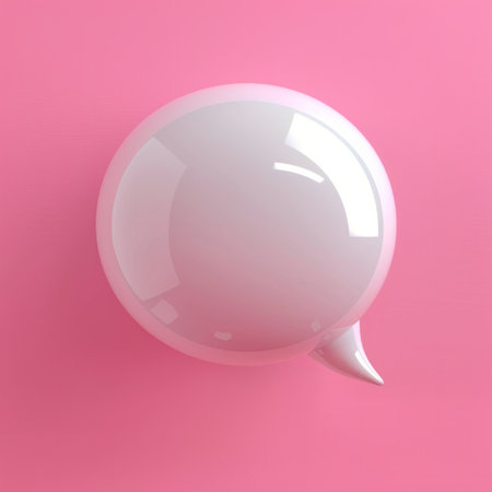 white plastic soft speech bubble against pink background.の素材