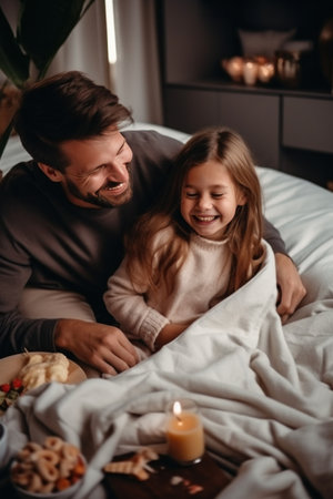 Aesthetic family breakfast, soft blankets, and cheerful faces enjoying cozy moments togetherの素材