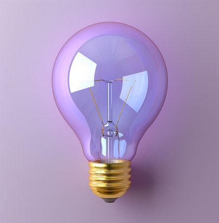 A radiant purple light bulb glowing in the dark, symbolizing ideas and creativity.の素材
