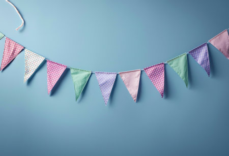 colorful bunting on blue background.の素材