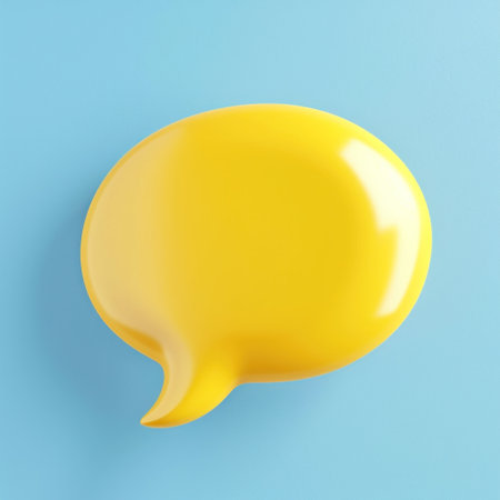 yellow plastic soft speech bubble against blue background.の素材