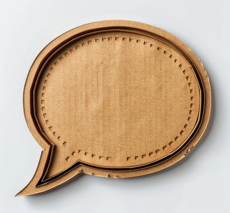 A brown speech bubble sticker placed on a plain white background.の素材