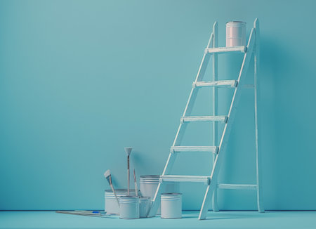 A white wooden step ladder stands against a light blue wall. There are several paint cans and brushes in front of the ladder, ready for a painting project.の素材