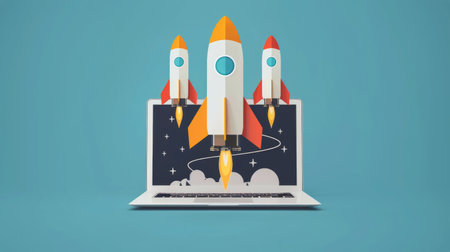 A laptop with a rocket placed on top, ready for launch into space.の素材