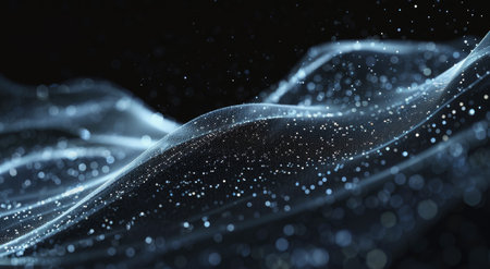 A vibrant blue wave stands out against the dark backdrop.の素材