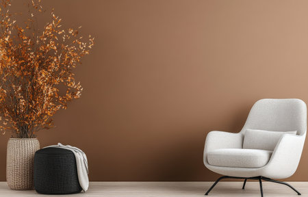 This stylish interior showcases a comfortable brown accent chair beside a gray pouf and a sleek vase filled with dried flowers, all set against a warm, textured wall.の素材
