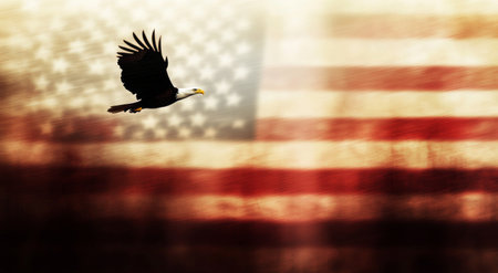 A bald eagle gracefully flies through the air, its wings spread wide in front of a softly blurred American flag, symbolizing freedom and national pride during a solemn moment.の素材