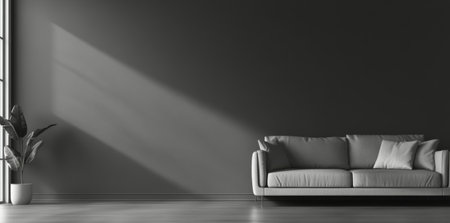 A stylish living room features a gray sofa against a dark wall, complemented by a potted plant. Soft natural light enters through a large window, enhancing the serene atmosphere.の素材