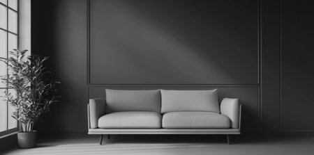 A stylish living room features a gray sofa against a dark wall, complemented by a potted plant. Soft natural light enters through a large window, enhancing the serene atmosphere.の素材