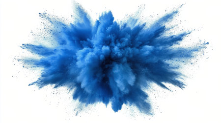 A vibrant burst of blue powder scatters and forms an impressive cloud against a white background, showing the motion and energy of the explosion. The vivid color creates a striking visual.の素材