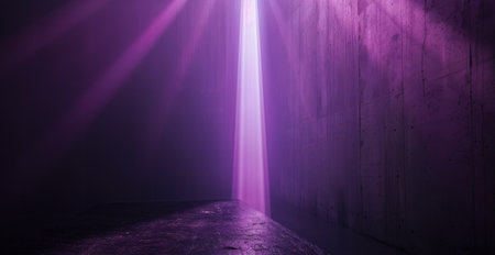 A single beam of purple light illuminates a dark corner of a concrete room.の素材