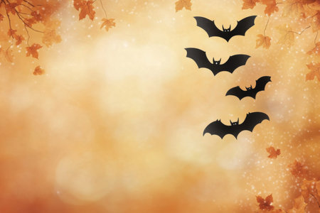 A group of bats glides through the dusky sky, silhouetted against a warm orange sunset. The tranquil atmosphere sets a captivating mood as night approaches.の素材