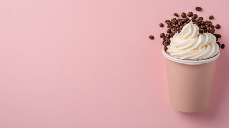 A rich chocolate cupcake topped with a swirl of cream frosting rests on a neutral colored surface. Scattered coffee beans enhance the desserts appeal, offering a delightful combination.の素材