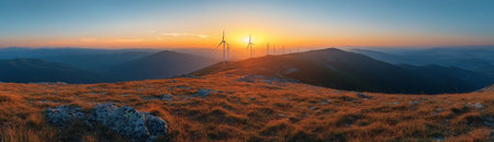 Golden hues of sunset illuminated rocky terrain and tall grasses, enhancing the tranquil atmosphere where wind turbines stand tall against the sky.の素材