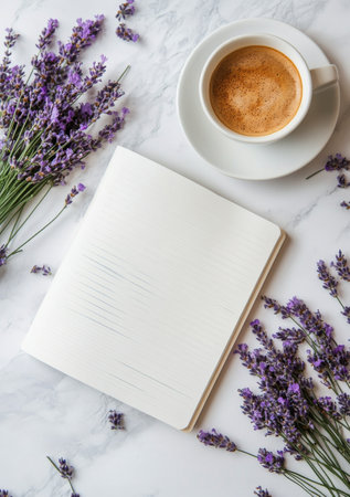 A warm cup of coffee sits atop an open notepad surrounded by fresh lavender flowers, creating a calming atmosphere perfect for reflection or creativity.の素材