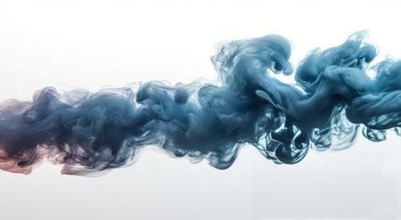 Ink droplets disperse in clear water, forming beautiful abstract shapes and smooth patterns. The vibrant blue color enhances the visual appeal in this creative display.の素材