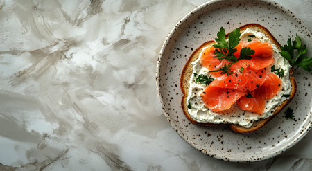 Three open-faced sandwiches topped with fresh salmon and cream cheese are arranged on a rustic plate. Fresh herbs add vibrant color, showcasing a delightful meal ready to enjoy.の素材