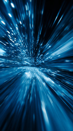 Bright streaks of light rush past in a fast-paced journey through a dazzling tunnel. The vibrant blue and white tones create a feeling of motion and depth in a cosmic setting.の素材