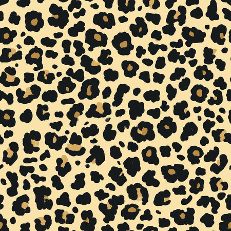 This stylish leopard pattern showcases bold black and brown spots on a light beige background, perfect for trendy fashion designs or home decor elements.の素材