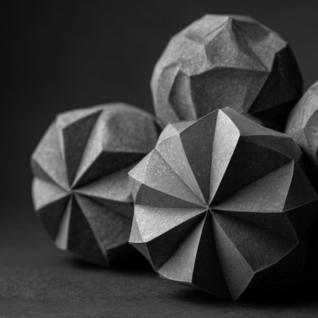 Polygonal black and white origami balls on a dark backgroundの素材
