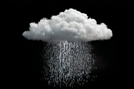 Low, dark cloud emits heavy rain in a striking visual. The scene captures the beauty and intensity of weather, creating a moody atmosphere filled with texture and movement..の素材