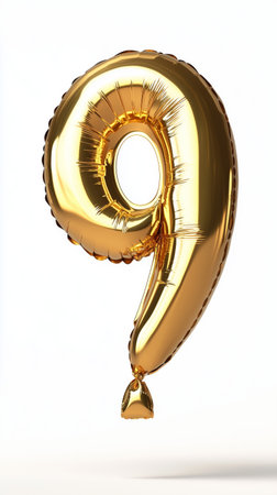A shiny gold balloon shaped like the number nine floats against a plain white background, ideal for birthday parties or special events, adding a festive touch to any celebration.の素材