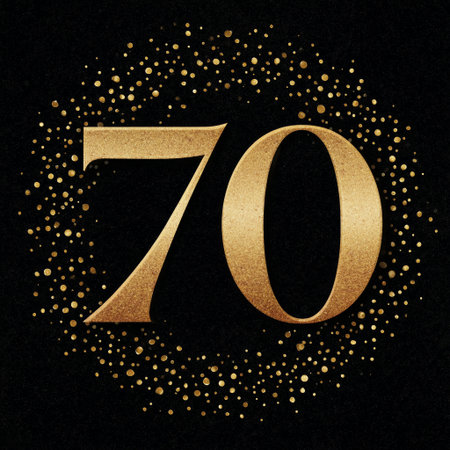 The golden number seventy stands out against a black background, surrounded by sparkling dots, creating an elegant and festive atmosphere for a special occasion.の素材