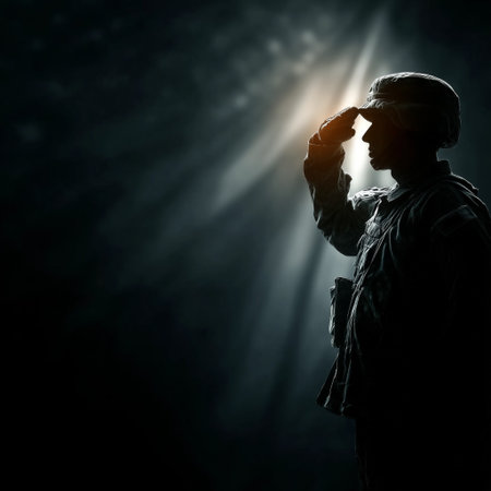 A soldier stands in profile, saluting with respect in a dark setting, illuminated by a beam of light. The scene captures a moment of honor and seriousness.の素材