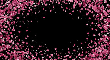 Bright pink confetti cascades against a dark backdrop, creating a vibrant atmosphere suitable for parties, weddings, or other joyful occasions. The scattered pieces add whimsy and fun.の素材