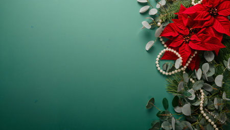 Bright red poinsettias and fresh eucalyptus branches create a cheerful holiday scene on a solid green background. The elegant display is enhanced with pearls for a festive touch.の素材