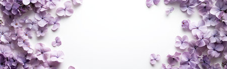 Delicate pastel flowers in shades of purple and pink create a stunning arrangement on a white background, showing their intricate details and soft colors.の素材