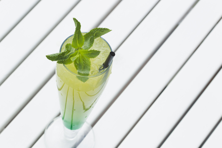 The cold lemonade with mint and ice on the outdoor veranda summer day, sunlight.の写真素材