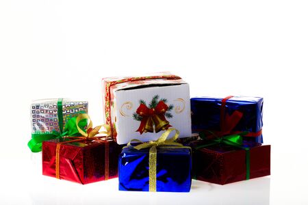 Gifts in a colorful packaging on a white background, studio lightingの写真素材