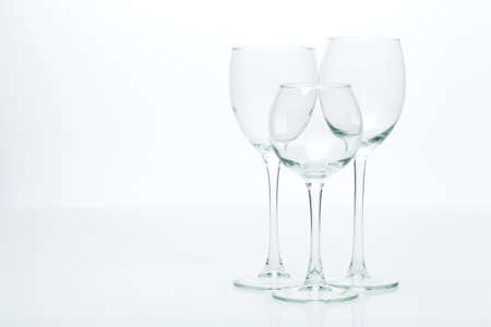 Three glasses for wine on a white background, studio light