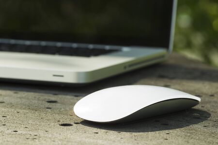 Laptop sunny summer day in the urban environment.の写真素材