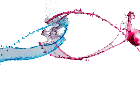 Colored splashes, drops, liquid water streams on a white isolated background. Color water splash isolated on white backgroundの写真素材