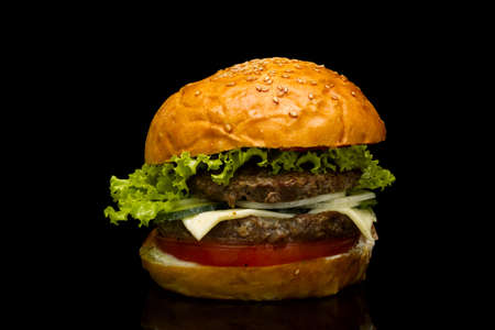 Burger on a black background, studio lightの写真素材