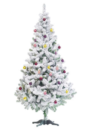 Artificial Christmas tree decorated with Christmas balls on an isolated white backgroundの写真素材