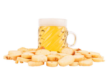 Beer and salted crackers isolated on a white backgroundの写真素材