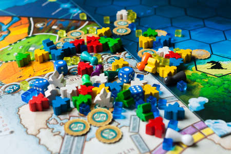 Board game concept- many board game field figures, meeple, dice and coinsの写真素材