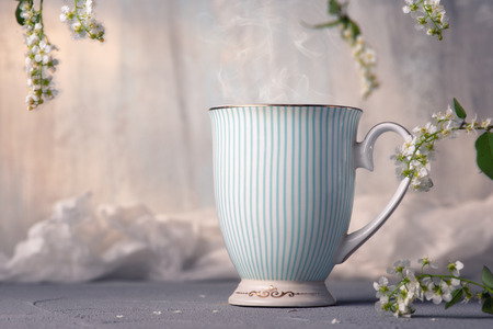 Fresh English tea in spring style on the tableの写真素材