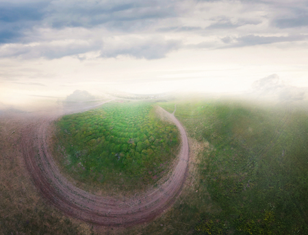 Beautiful panoramic landscape with a road and a skyの写真素材