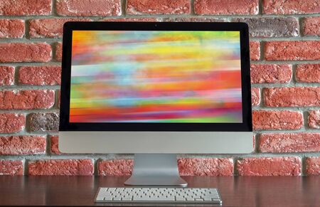 Computer screen with LGBT screensaver close up