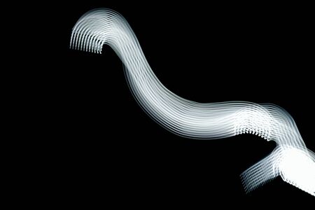 The light texture on the black background